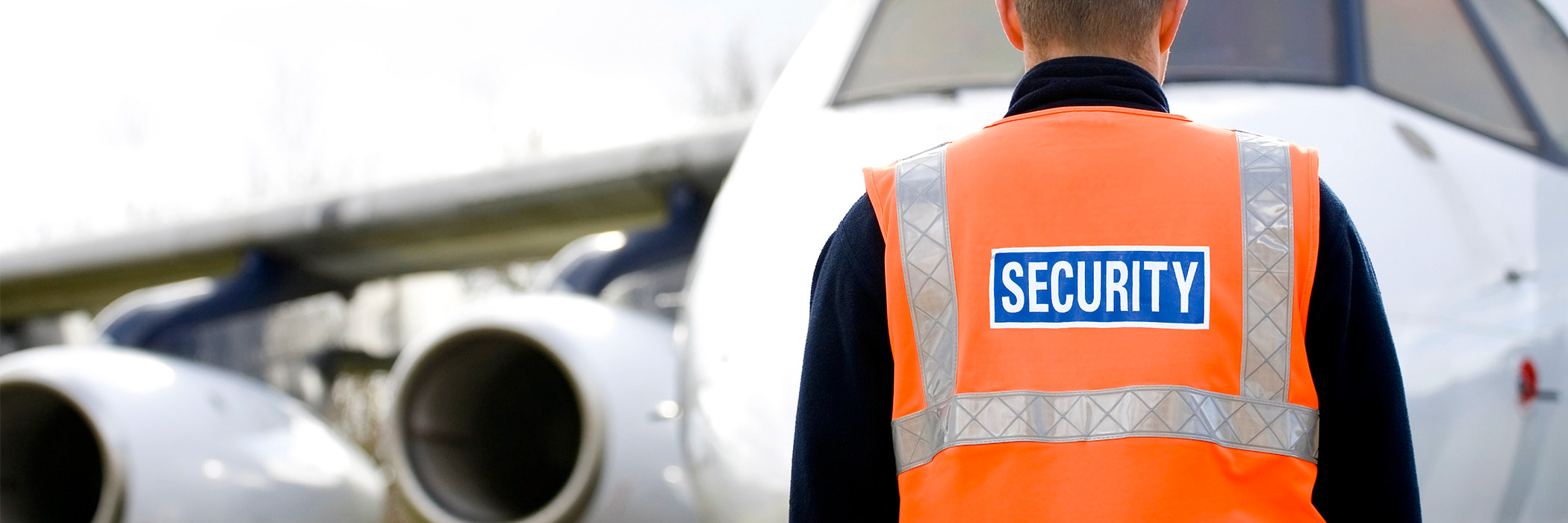 Airport officer in security vest