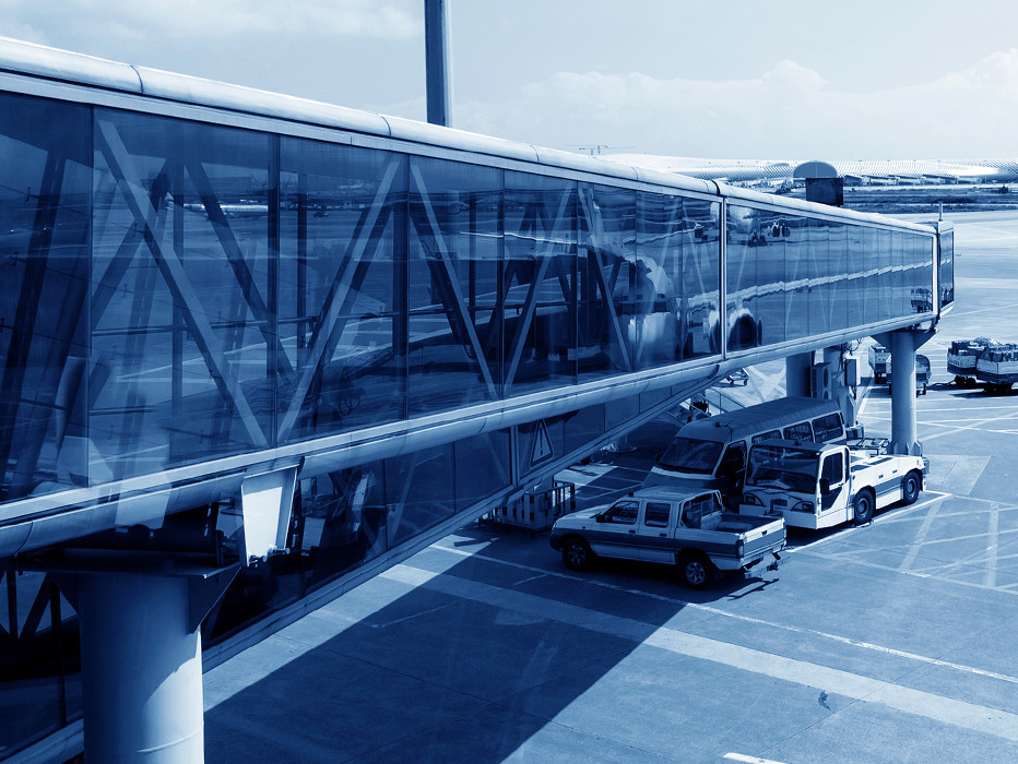 Airport jet bridge and service vehicles