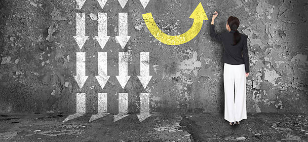 Person writing on wall