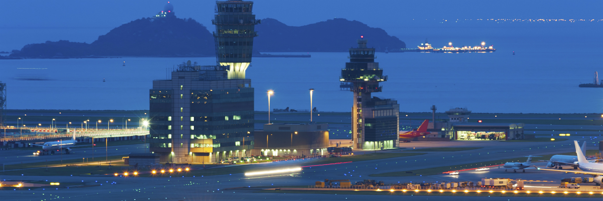 Large bayside airport at dusk