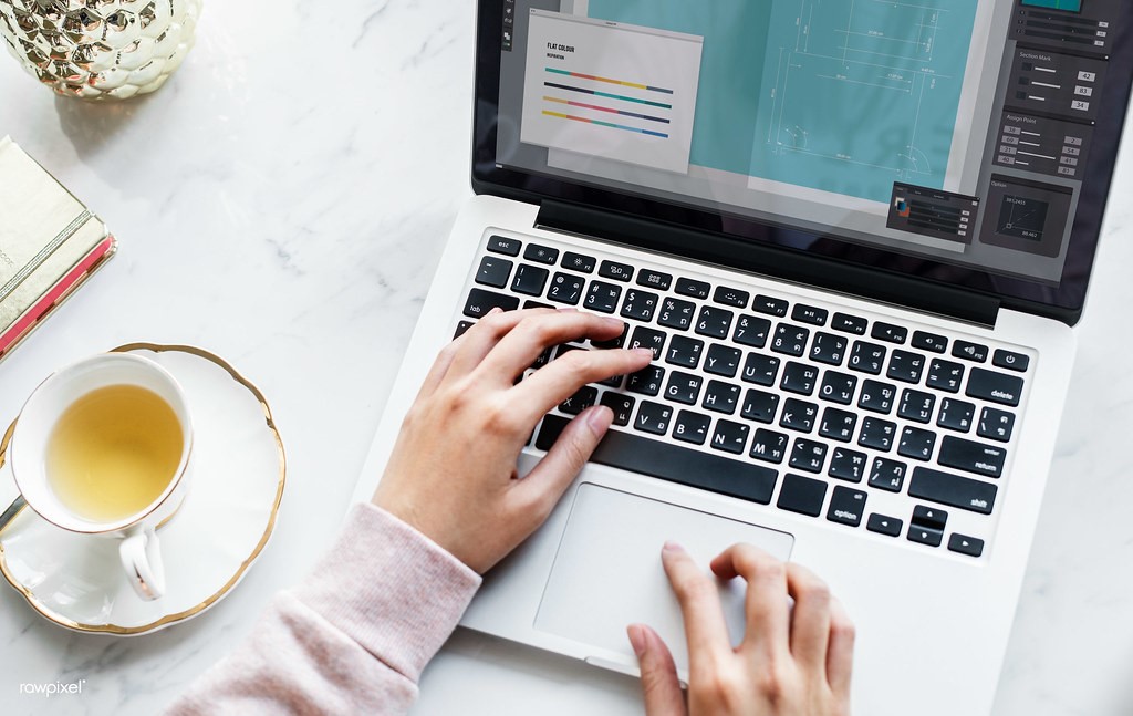 laptop computer and cup of coffee