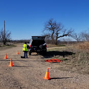 Rural sUAS operation setup blocked off by traffic cones