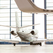 Private jets in fancy hangar