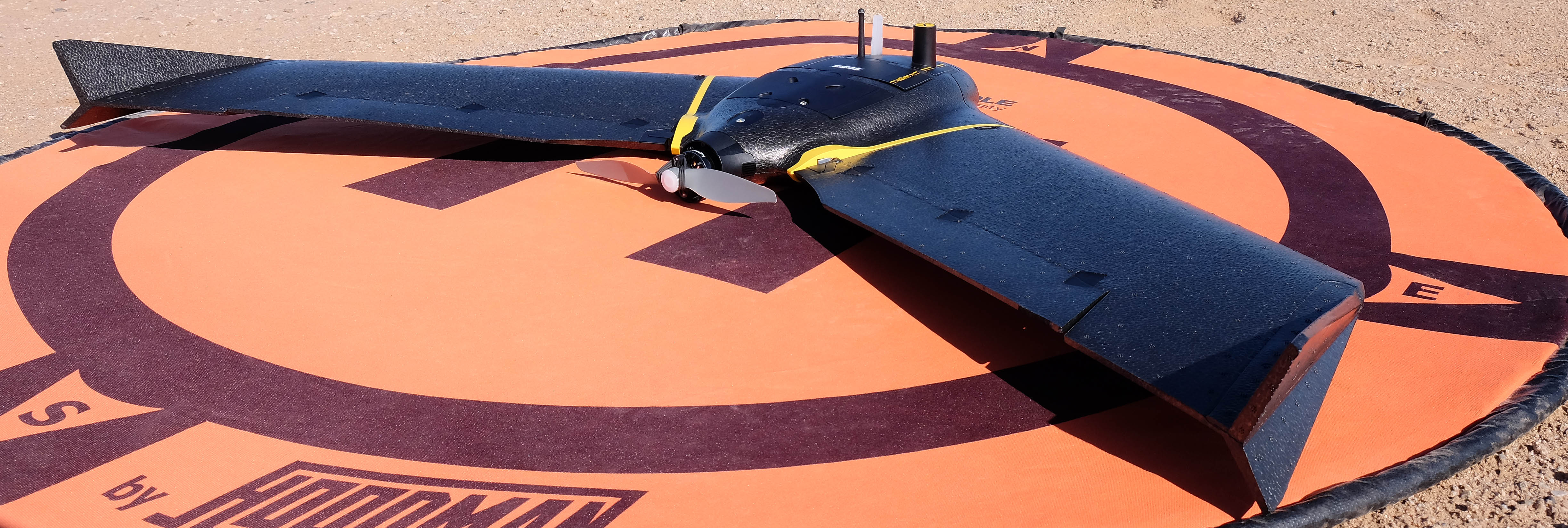 Fixed wing drone on a landing pad