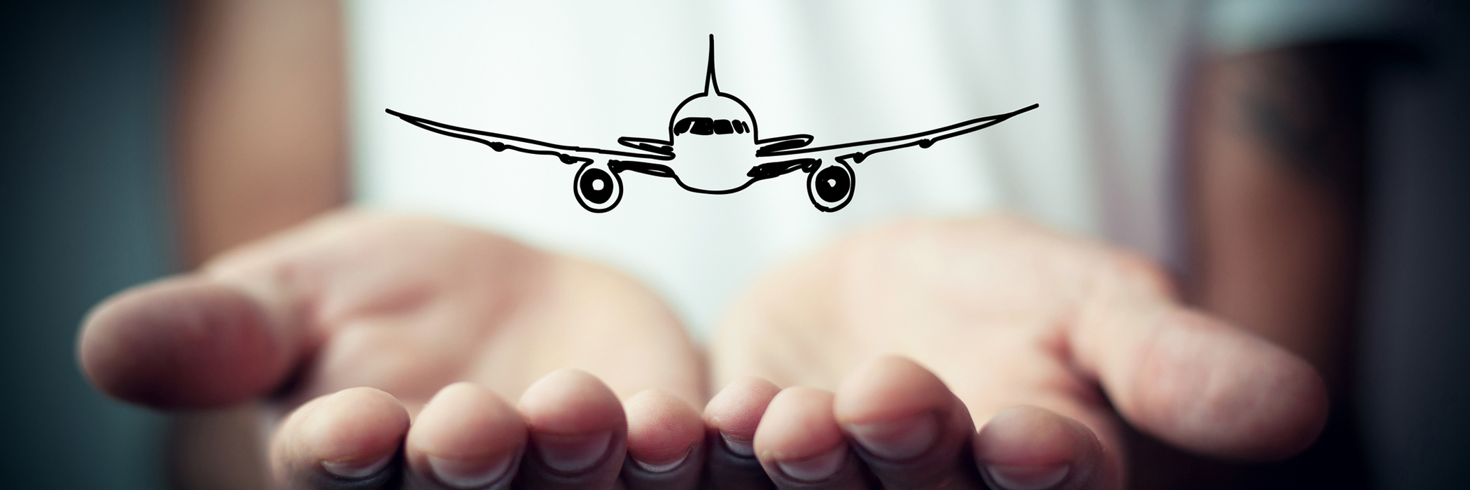 airplane nestled inside hands